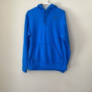 Bright blue Nike Therma-fit sweatshirt.